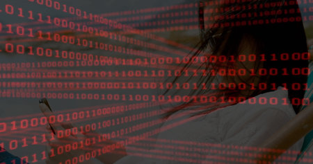 Woman wearing white shirt holding smartphone in dim room, with red binary code overlay, copy space....