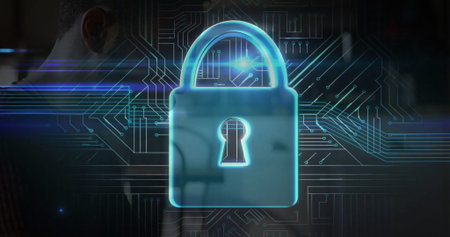 Displaying blue glowing padlock icon in virtual circuit board interface, with dark shirt silhouette....