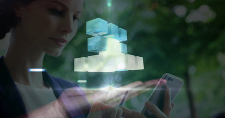 Projecting woman displaying hologram cubes in park with smartphone light flares, copy space....