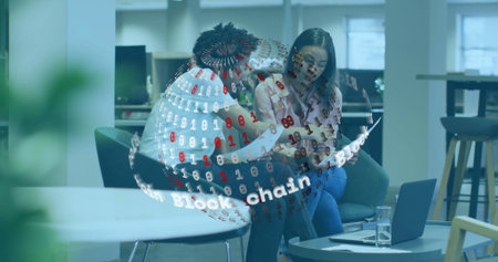 Discussing blockchain technology, diverse colleagues with digital binary globe overlay in office....