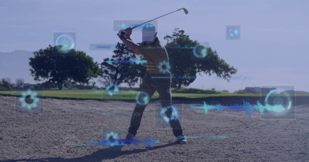 Swinging golfer striking golf ball and analyzing swing data at sand bunker, with digital overlays. Athlete, sports, professional, innovation, technology, outdoor, precisionの写真素材