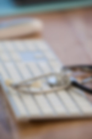 Blurry stethoscope on keyboardの写真素材