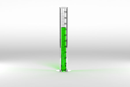 Close-up of test tube with green chemical solutionの写真素材