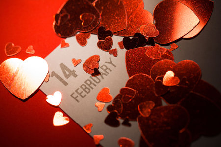 Digital image of red hearts on paper with dateの写真素材