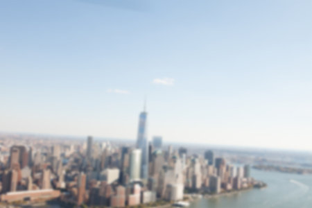 Blurry view of cityscape during summerの写真素材