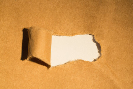 Directly above shot of torn paper of boxの写真素材