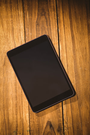 Overhead of tablet on desk with copy spaceの写真素材