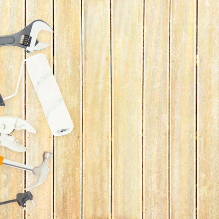 Tools on wooden background