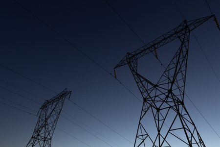 The evening electricity pylon silhouetteの写真素材