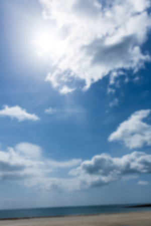 Scenic view of beach against cloudy skyの写真素材
