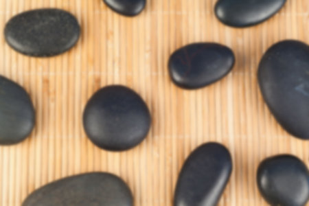 High angle view of pebbles on wooden tableの写真素材