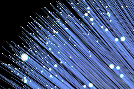 Composite image of blue illuminated fiber optics on black backgroundの写真素材