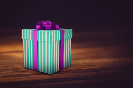 Flat design mint green striped gift box is sitting on wooden tabletop, with purple ribbon bow. Festive, celebration, packaging, elegance, sophistication, minimalism, retailの写真素材