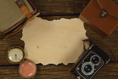 Paper piece, bag, clock and camera on table, Close-upの写真素材