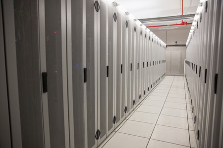 Server cabinets are receding into server room hallway in 3D render with raised floor tiles....