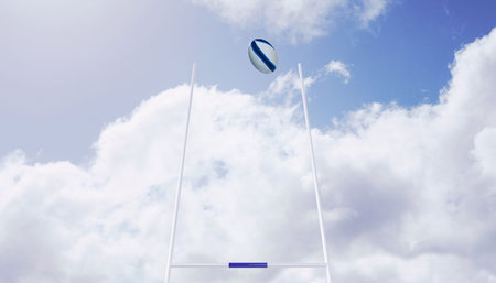 Rugby ball flying between posts
