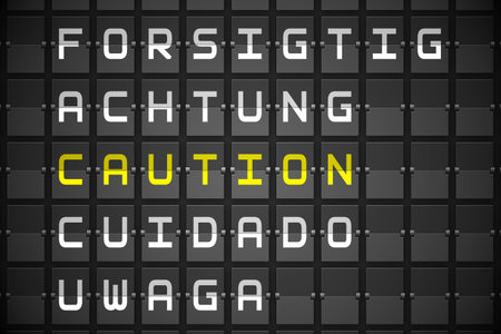 Caution in languages on digitally generated black mechanical boardの写真素材