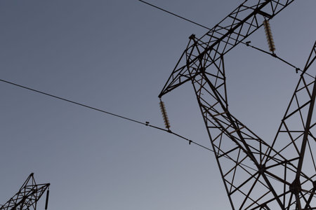 The evening electricity pylon silhouetteの写真素材