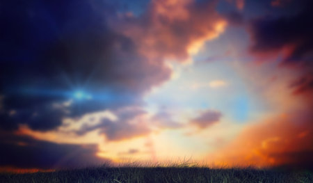 Blue and orange sky with cloudsの写真素材