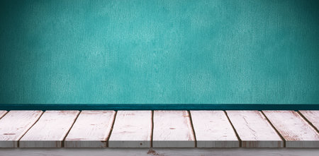 Close up of wooden shelf on turquoise wallの写真素材