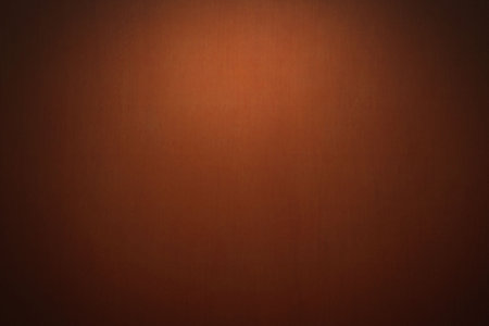Blank brown wall is filling flat design space with subtle gradient and faint texture, copy space....