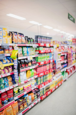 Interior of illuminated supermarketの写真素材