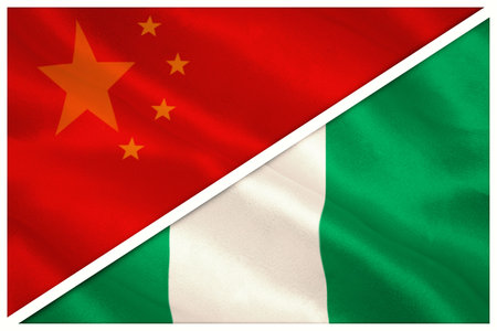 close-up of Chinese and Nigerian flags against white backgroundの写真素材