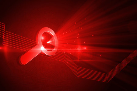 Shiny red magnifier on black backgroundの写真素材