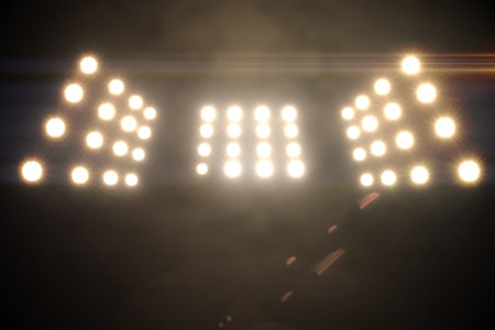 Low angle view of Illuminated floodlight at nightの写真素材