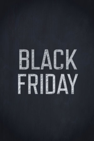Displaying BLACK FRIDAY text in chalk-style lettering on dark charcoal textured chalkboard backdrop. Sale, promotion, advertising, chalkboard, handwritten, rustic, minimalの写真素材
