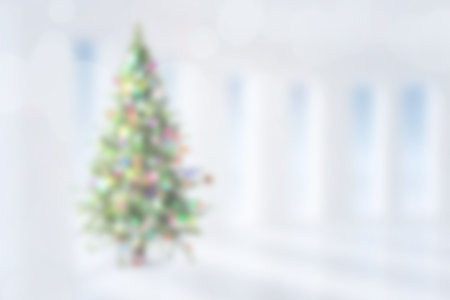Blurry christmas tree in roomの写真素材