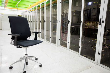 Front view of swivel chair in front of data center