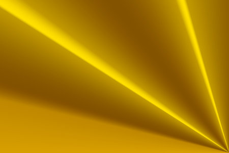 Full frame shot of illuminated light beams against yellow background, copy space. Gradient, advertisement, blank, studio shot, illustration and abstract concept.の写真素材