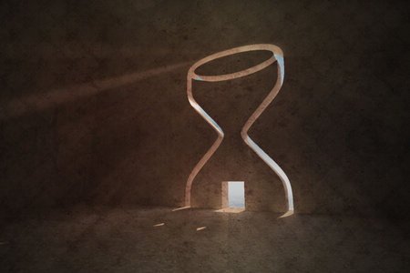 Hourglass door in dark roomの写真素材