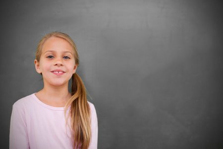 Cute pupil with chalkboardの写真素材