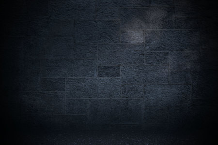 Textured stone brick wall is standing in dimly lit empty chamber, flat design with soft shadows. Industrial, rustic, moody, minimalist, architectural, cinematic, atmosphericの写真素材