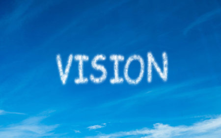 Vision written in white in skyの写真素材