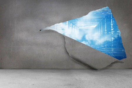 Rip on wall showing technology interfaceの写真素材