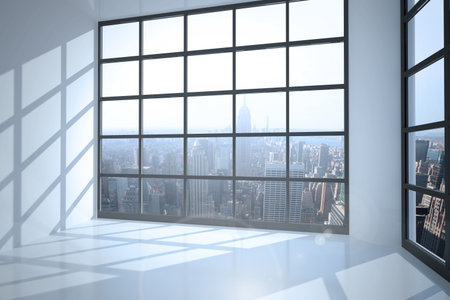 Room with large window showing cityの写真素材