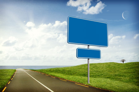 Flat design illustration is showing blank blue road sign on coastal road with leafless hilltop tree. Navigation, signage, outdoor, environment, tranquility, landscape, minimalismの写真素材