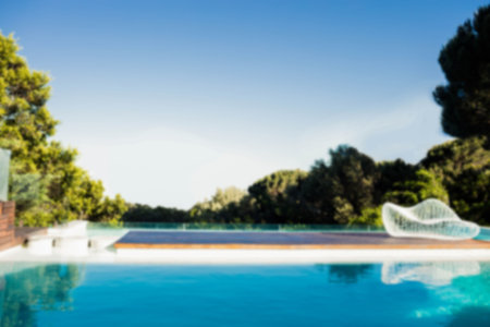 Swimming pool against clear blue sky