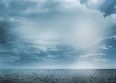 Flat design illustration showing tranquil ocean horizon under cloudy sky with rippled water. Seascape, landscape, serenity, horizon, atmospheric, muted tones, natural beautyの写真素材