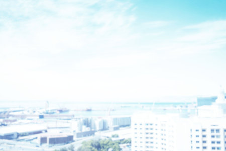 Blurry view of cityscape during summerの写真素材