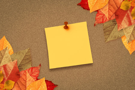 Autumn leaves with yellow noteの写真素材