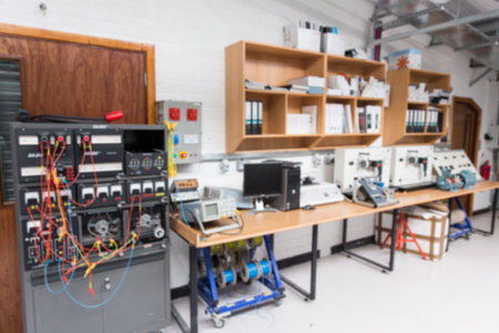 Flat design electronics lab is featuring equipment rack, test bench, oscilloscopes and cable reels. Technology, instrumentation, engineering, precision, modern, industrial, scienceの写真素材