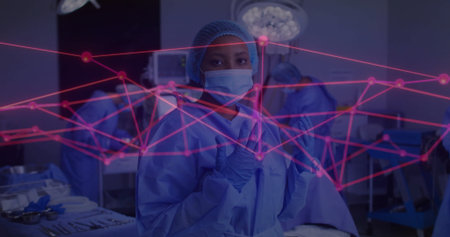 In hospital, medical professionals performing surgery with digital image overlay. Healthcare, teamwork, innovation, technology, operation, procedureの写真素材
