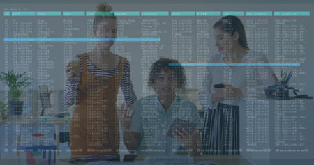 Analyzing data with digital image overlay, diverse team working in office. Teamwork, collaboration, analysis, technology, innovation, creativityの写真素材