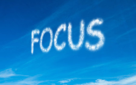 Focus written in white in skyの写真素材