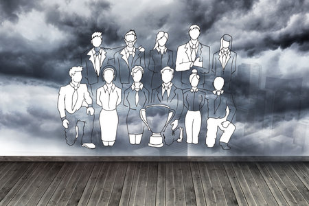 Black white figures on wall with stormy skyの写真素材