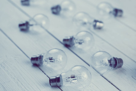 High angle view of light bulbs on floorboardの写真素材